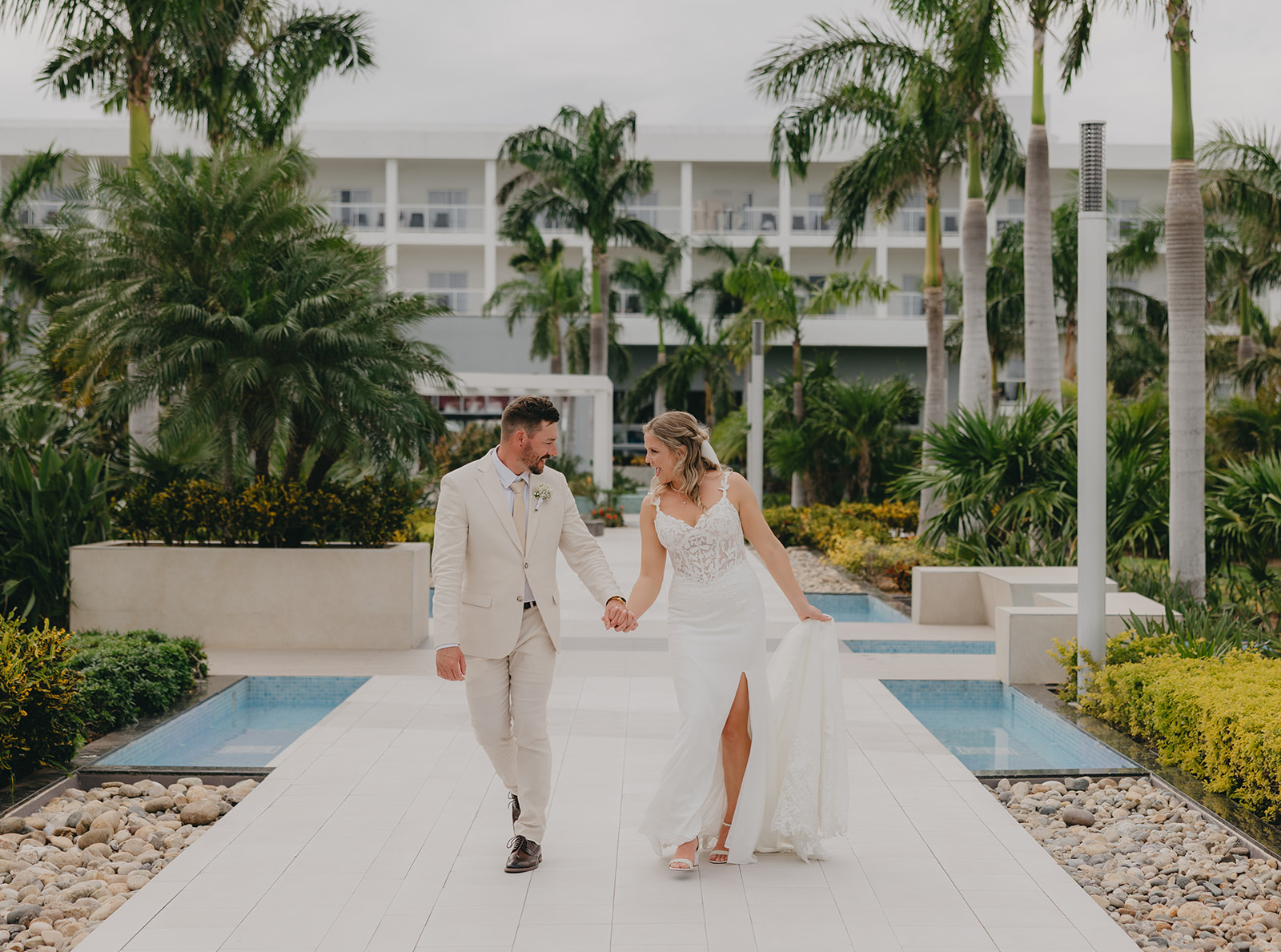 Black and white wedding portrait of a couple, captured in a candid moment.